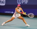 Iga Swiatek of Poland in action during round of 16 match against Ekaterina Alexandrova of Russia at 2024 Miami Open