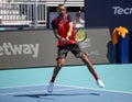 Professional tennis player Nick Kyrgios of Australia in action during his 2022 Miami Open round of 16 match Royalty Free Stock Photo