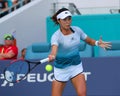 Professional tennis player Qiang Wang of China in action during her quarter-final match at 2019 Miami Open at Hard Rock Stadium Royalty Free Stock Photo