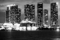 Miami night downtown. Cruise ship in the Port of Miami at sunset with multiple luxury yachts. Night view of cruise Royalty Free Stock Photo