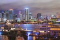 Miami night downtown. Miami Florida at sunset, skyline of illuminated buildings and Macarthur Causeway bridge. Royalty Free Stock Photo