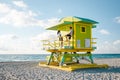 Miami south beach Florida, couple by lifeguard hut during Sunrise Miami Beach, men and woman on the beach Royalty Free Stock Photo