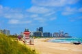 Miami South Beach lifeguard tower and coastline with cloud and blue sky. Lifeguard Post on Miami Beach. Royalty Free Stock Photo