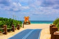 Miami South Beach lifeguard tower and coastline with cloud and blue sky. World famous travel location. Royalty Free Stock Photo