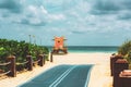 Miami South Beach lifeguard tower and coastline with cloud and blue sky. World famous travel location. Royalty Free Stock Photo