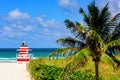 Miami South Beach skyline. Lifeguard tower in colorful Art Deco style and Atlantic Ocean at sunshine. Royalty Free Stock Photo