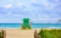 Miami South Beach skyline. Lifeguard tower in colorful Art Deco style and Atlantic Ocean at sunshine. Panorama of Miami Royalty Free Stock Photo