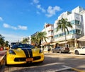 Yellow Corvette parked in a street in Miami, United States of America