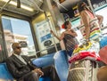 people in the downtown Metro bus in Miami, USA