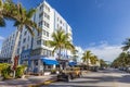 statue of Humprey Bogart as driver in an old vintage car parking at ocean drive