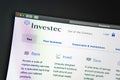 Investec company website homepage. Close up of Investec logo