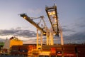 Miami, USA - March 01, 2016: cranes and cargo containers stacked in port. Container port or terminal with night illumination. Ship Royalty Free Stock Photo