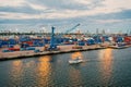 Miami, USA - March 01, 2016: maritime container port with cargo ship and cranes. Yacht float along sea port and terminal Royalty Free Stock Photo