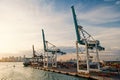 Sea port, terminal or dock. Maritime container port with cargo ship, cranes. Freight, shipping, delivery, logistics Royalty Free Stock Photo