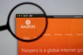 Naspers company website homepage. Close up of Naspers logo.