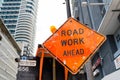 Miami, USA - October 30, 2015: construction sign on city road. Road work ahead warning and safety. Transportation traffic and trav