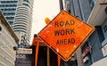 Miami, USA - October 30, 2015: construction sign on city road. Road work ahead warning and safety. Transportation