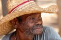 Elderly man wearing a straw hat and smiling. Miandrivazo, Madagascar
