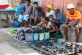 Street market in Miandrivazo, woman selling charcoal. Madagascar