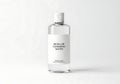 Micellar Cleansing Water Bottle: Clear Bottle with White Label on White Background {Ai generated Royalty Free Stock Photo