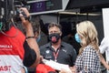 Michael Andretti, BMW i Andretti Motorsport Team owner, gives interview at pit line during 2021 New York City E-Prix in Brooklyn Royalty Free Stock Photo