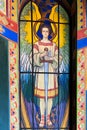 Michael archangel on staining glass in the Church of the Sacred Hea