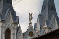 Michael archangel statue on roof of St. Anna Roman Catholic Church, Christian temple in Gothic Revival style Royalty Free Stock Photo