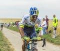 Michael Matthews Riding on a Cobblestone Road - Tour de France 2