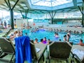 Michalovce, Slovakia - December 30, 2019: People resting at swimming pool in Thermal park Sirava