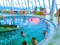 Michalovce, Slovakia - December 30, 2019: People resting at swimming pool in Thermal park Sirava