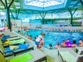 Michalovce, Slovakia - December 30, 2019: People resting at swimming pool in Thermal park Sirava