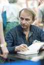 Michel Houellebecq famous French author dedicating in Budapest