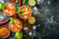 Michelada cocktail with spicy rim and lime garnish