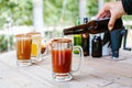 Michelada mexican beer with tomato juice, hot sauce and lemon, Mexican cocktail drink in Mexico