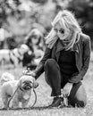 Michelle Collins ready to judge a dog show on Hampstead heath in London with her dog Humphrey