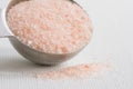 Pink Himalayan Sea Salt Spilled from a Teaspoon Royalty Free Stock Photo