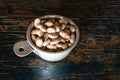 Uncooked Pinto Beans in a Measuring Cup