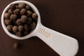 Whole Allspice on a Tablespoon Royalty Free Stock Photo