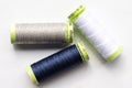 Blue, Grey, and White Sewing Thread