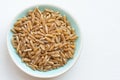 Uncooked Ancient Kamut Grain in a Bowl Royalty Free Stock Photo