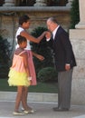 Michelle Obama and her daughter Sasha are received by King of Spain