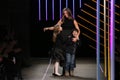 Michelle Smith bows with her children at the Milly By Michelle Smith Show during MBFW Fall