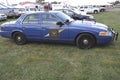 A Michigan State police cruiser in a lot