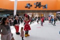 Mickey and Minnie mouse figurines cheering up the zumba dancers