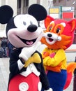 Mickey Mouse and Brother Fox. Artists Dressed in Caranaval Costumes