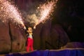 Mickey mouse with fireworks coming out of his hands on Fantasmic Show at Hollywood Studios in Walt Disney World 1