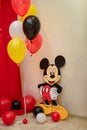 Mickey Mouse party. Character of Walt Disney cartoon with colorful balloons