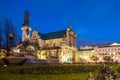 Mickiewicz Monument and Church of the Assumption of the Virgin Mary and of St. Joseph known as the Carmelite Church at night