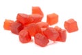 Micro close-up and details of Organic Indian red tutti frutti sweet soft candy isolated over white background