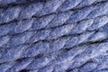 Micro close up of purple wool threads with copy space